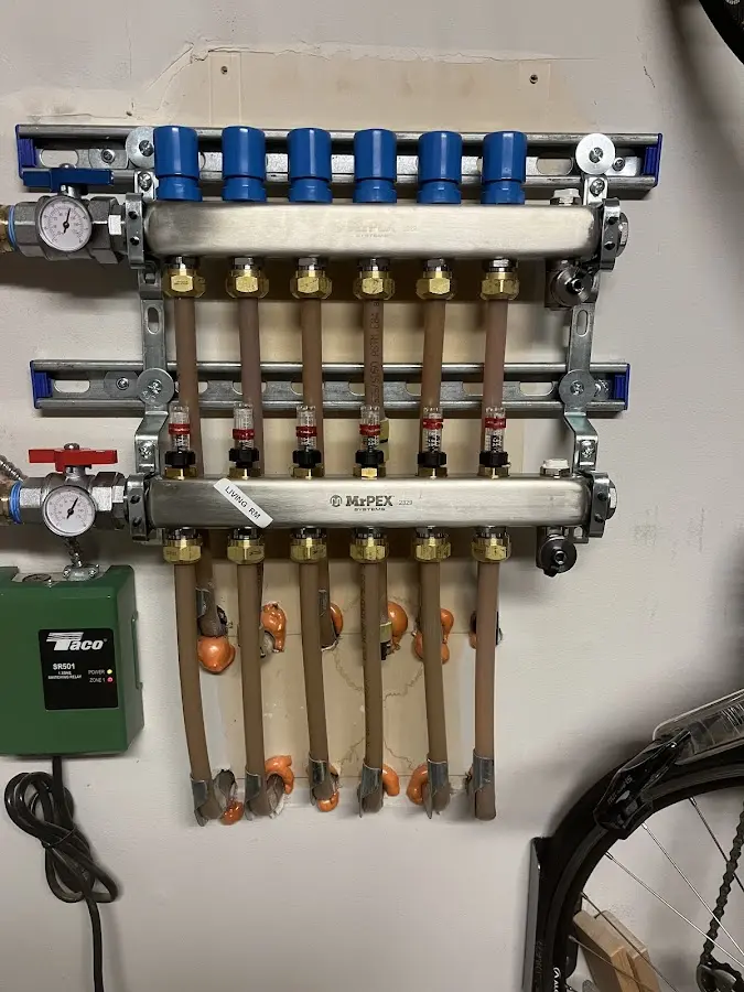 Plumber performing Water Heater Repair at a residential property in Atoka